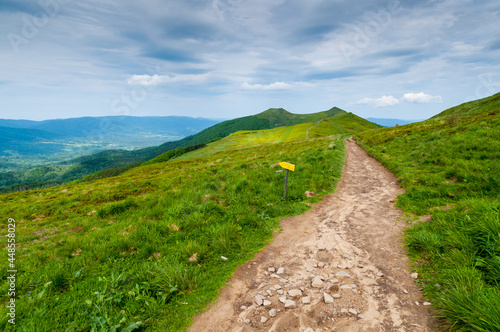 Sunrise seen from the summit of Połonina Wetlińska towards the Bieszczady peaks, Bieszczady forest, Bieszczady mountains, Carpathians photo