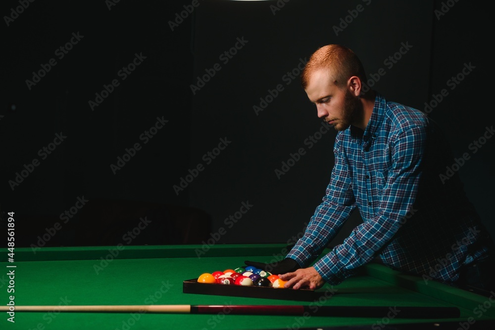 Playing billiard - Close-up shot of a man playing billiard Playing billiard - Close-up shot of a man playing billiard