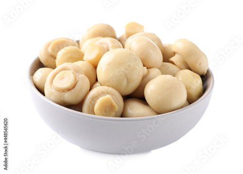 Tasty marinated mushrooms in bowl isolated on white