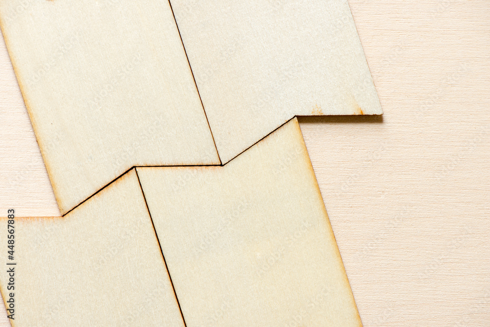Fototapeta premium wooden tags arranged on a light wood background