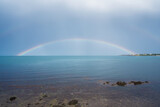 Wonderful seaside view with a rainbow over the sea