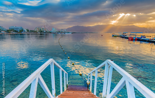 Morning view on the central public beach of Eilat - famous tourist  resort an...