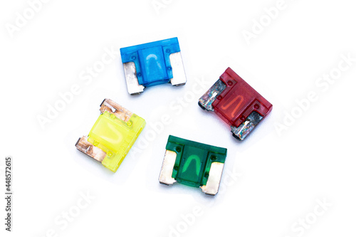 Old Car fuse colorful color on white background micro size use for protection in electric system of car
