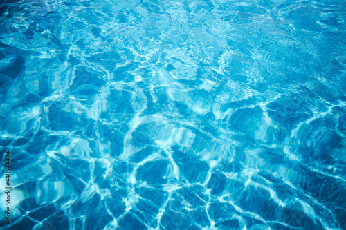 Water pool background in summer with waves