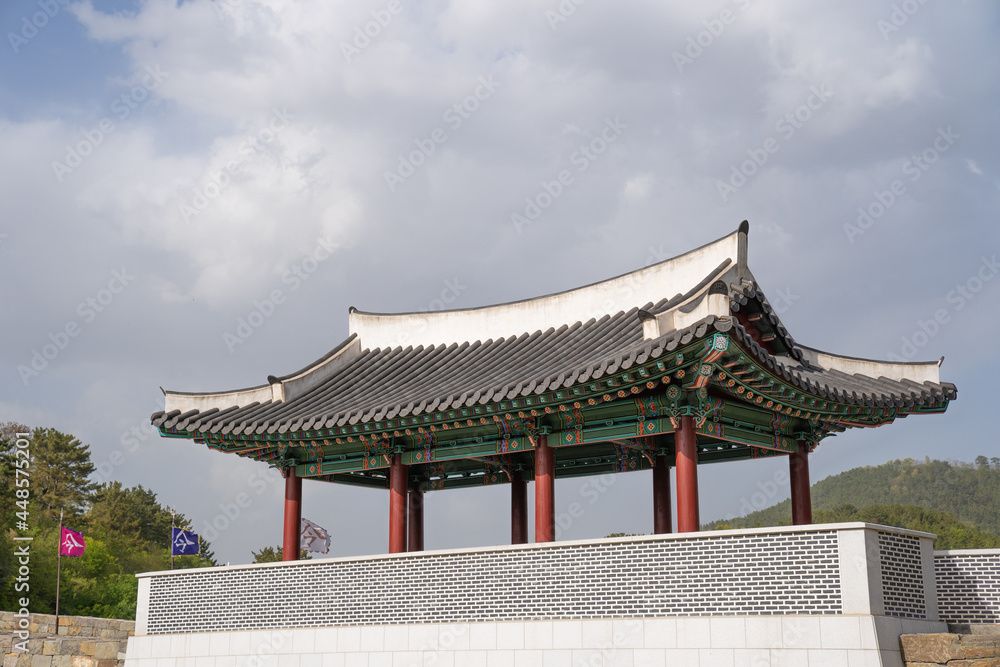Traditional Korean architecture located on a hill with a panoramic view