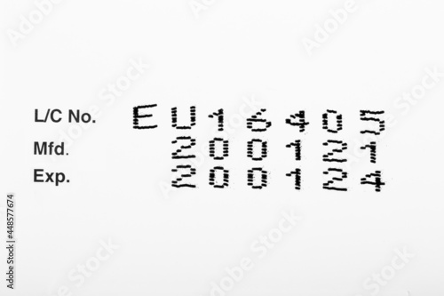 Photography Instruction of lot number, manufacturing date, and expiry date label of a product