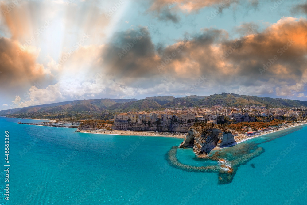 Tropea, Calabria. Aerial view of city, monastery and coastline from drone perspective.
