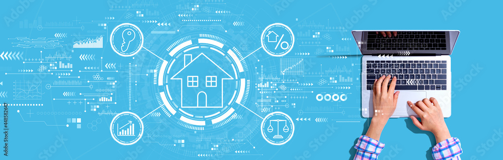 Real estate theme with person using a laptop Real estate theme with person using a laptop