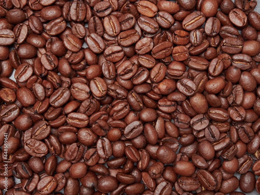 Obraz premium roasted coffee bean background, top view