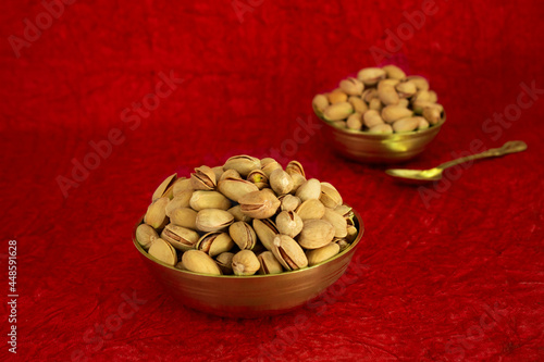Royal Pistachio Bowl Red Background Photo