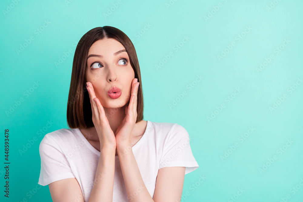 Portrait of attractive amazed worried girl oops copy space pout lips isolated over bright teal turquoise color background Portrait of attractive amazed worried girl oops copy space pout lips isolated over bright teal turquoise color background