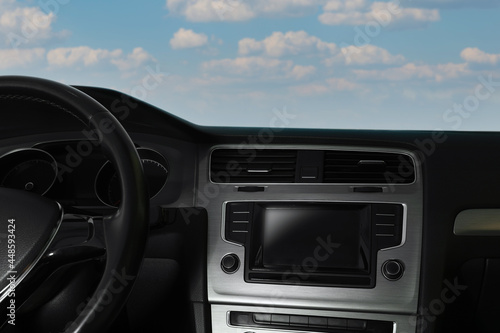 View of dashboard with navigation system in modern car © New Africa