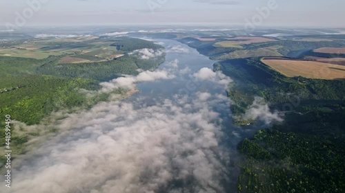 Wallpaper Mural Aerial drone view of beautiful river between mountains, fields during misty morning. Magical fog or low clouds. Nature background, topography of earth's surface Torontodigital.ca