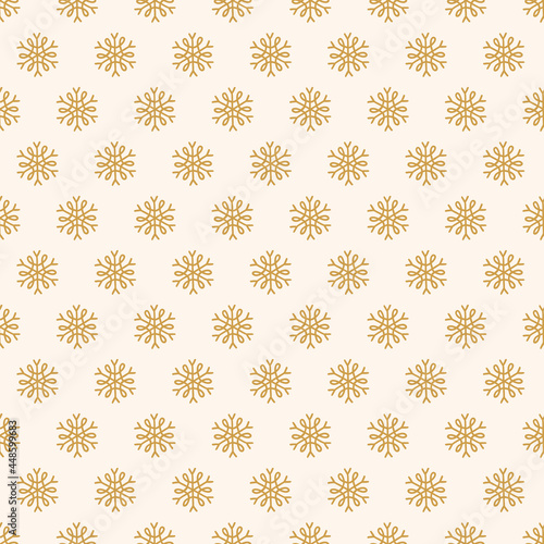Christmas seamless pattern with gold snowflakes on white background