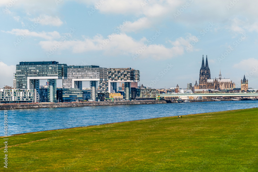 Cologne Koln, Germany, Panorama view of the Rhine River with Kranhaus Buildings, Rheinauhafen and Dom Cathedral