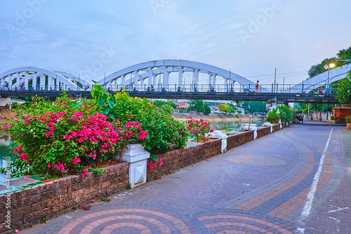 Bank of Wang river and Ratsadaphisek Bridge, Lampang, Thailand photo