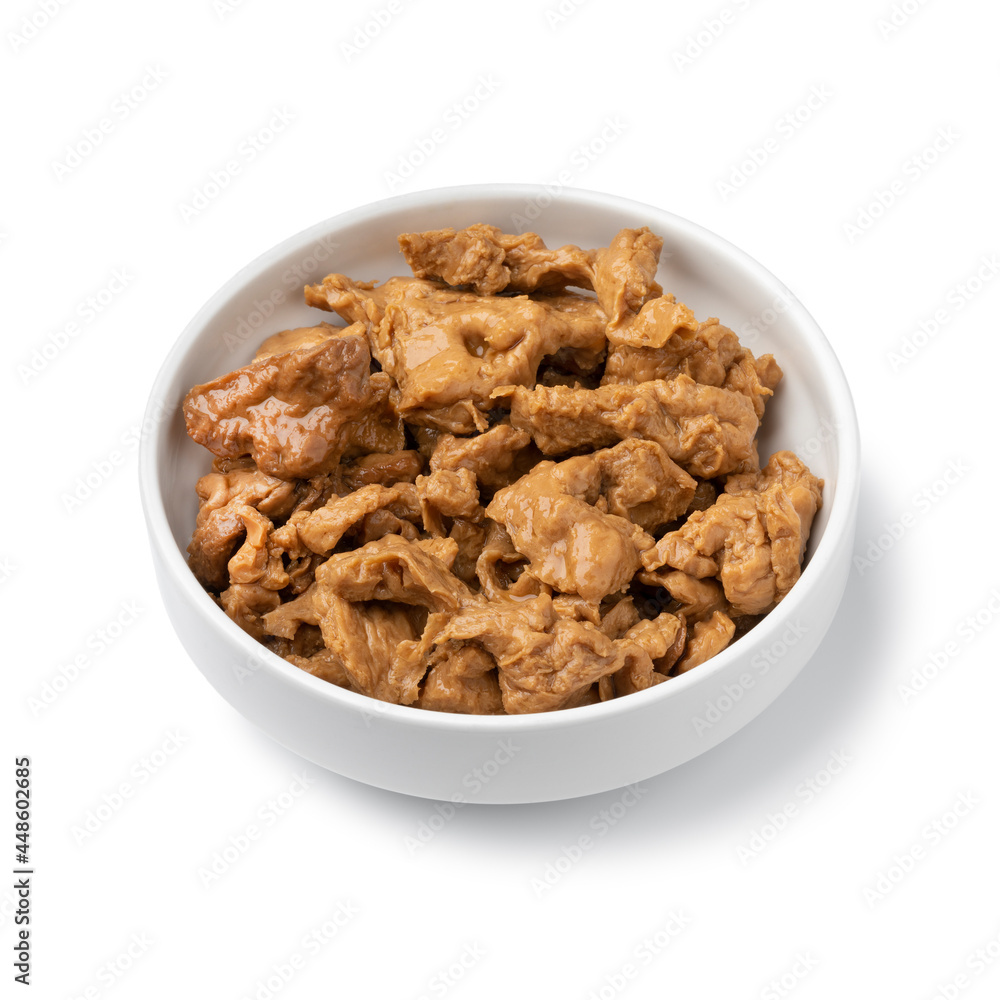 Bowl with raw Asian Seitan, wheat gluten, close up isolated on white background Bowl with raw Asian Seitan, wheat gluten, close up isolated on white background