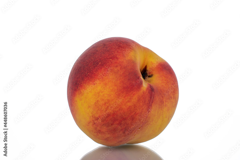 One ripe peache, close-up, isolated on white. One ripe peache, close-up, isolated on white.