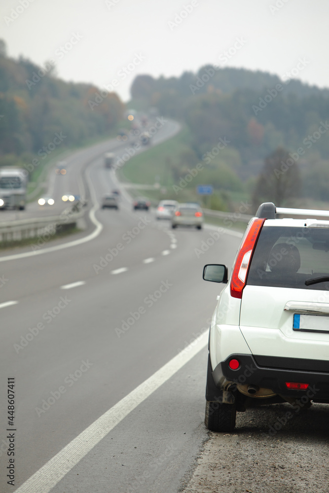 parked car on roadside of highway