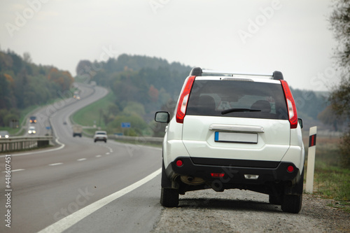 parked car on roadside of highway