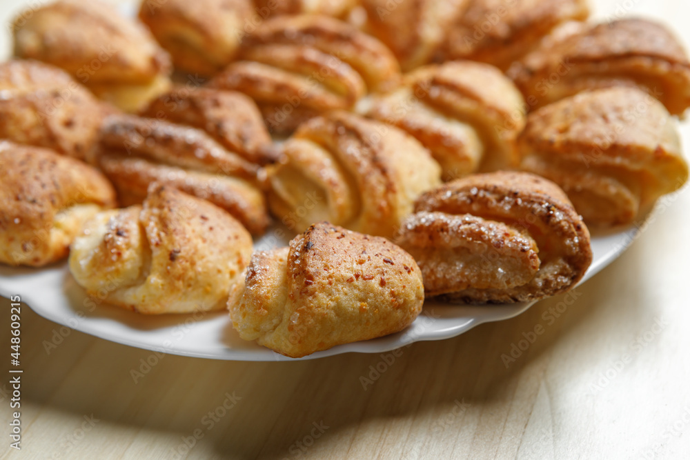 Freshly prepared pastries with a crispy crust are on a plate.