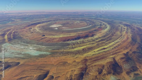 High altitude bird view of Richat Structure or the Eye of Africa it is a prominent circular feature in the Sahara's Adrar Plateau near Ouadane west central Mauritania in Northwest Africa 4k animation