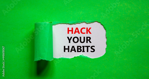 Hack your habits symbol. Words 'Hack your habits' appearing behind torn green paper. Beautiful green background. Business, psychology and hack your habits concept, copy space.