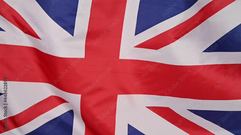 Background of UK flag waving in the wind Background of UK flag waving in the wind