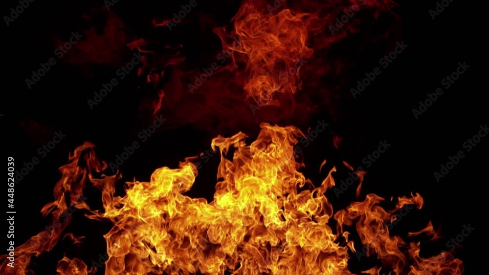 Super slow motion of fire isolated on black background. Filmed on high speed cinema camera, 1000 fps. Speed ramp effect. Super slow motion of fire isolated on black background. Filmed on high speed cinema camera, 1000 fps. Speed ramp effect.