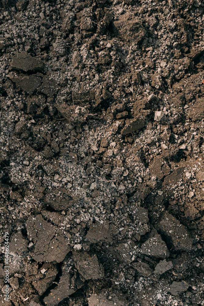 Black Dark Soil Dirt Background Texture, Natural Pattern. Flat Top View. Clods of Earth Black Dark Soil Dirt Background Texture, Natural Pattern. Flat Top View. Clods of Earth