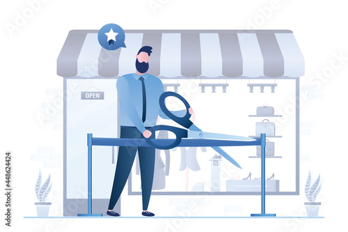 Ribbon cutting ceremony, businessman uses big scissors. Starting business project, launching new shop, grand opening event. Storefront with clothing, accessories.