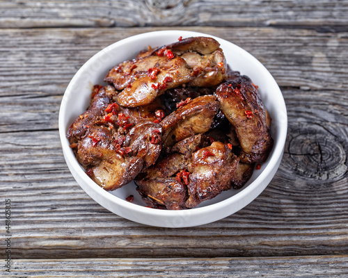 fried Chicken Liver seasoned with chilli flakes photo