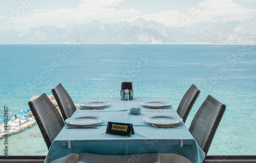 A table in a restaurant or a summer cafe on the sea coast of Antalya  Turkey. Place in a restaurant with a wonderful sea view.