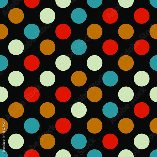 seamless pattern of multicolored circles on a dark background for prints on fabric, packaging, clothing, linen, as well as for interior decoration, covers and backgrounds