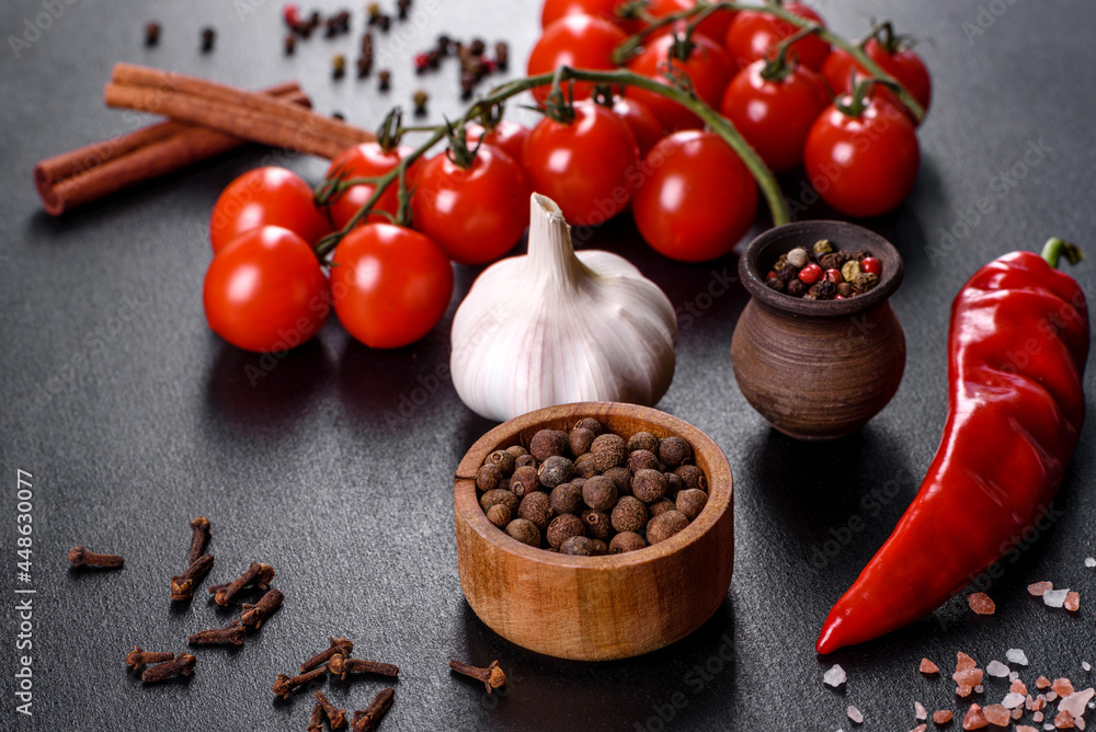 ingredients for cooking, spices, garlic, tomatoes and herbs ingredients for cooking, spices, garlic, tomatoes and herbs