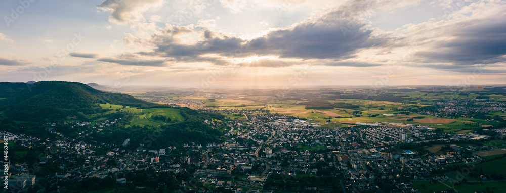 Aerial panorama of the city of Heubach, near Aalen, Ostalbkreis, Germany at sunset 