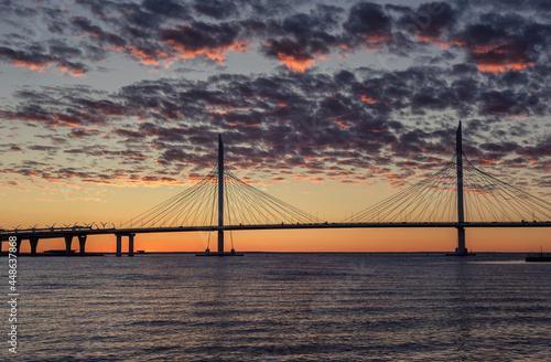 View of the cable-stayed bridge and the bay at sunset