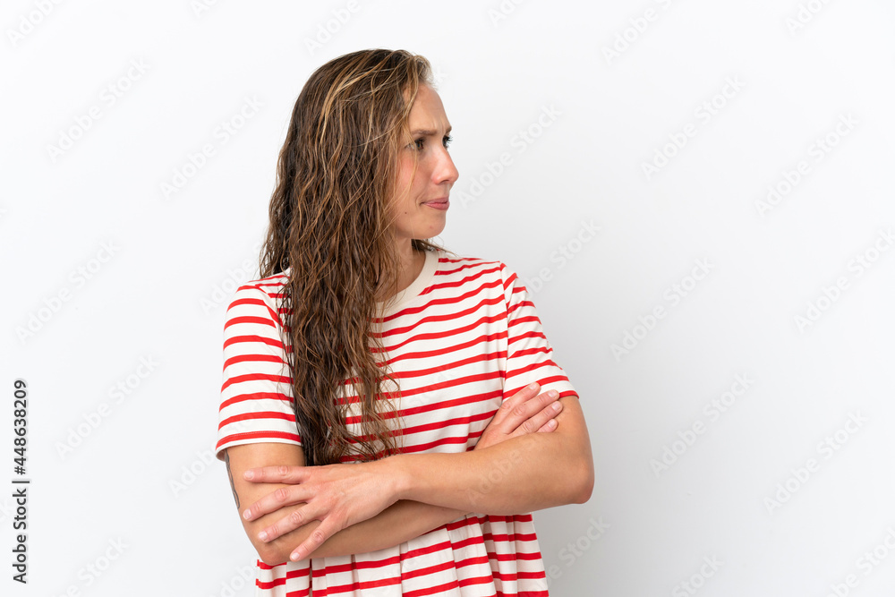 Young caucasian woman isolated on white background looking to the side Young caucasian woman isolated on white background looking to the side