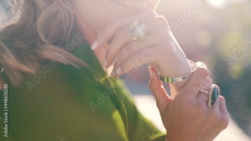female hands in jewelry close-up