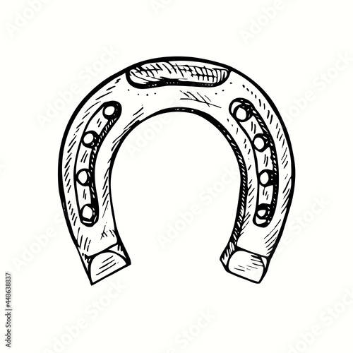 Horseshoe. Ink black and white doodle drawing in woodcut style