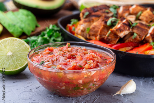 Tex-Mex cuisine salsa Asada sauce with roasted vegetables, horizontal photo