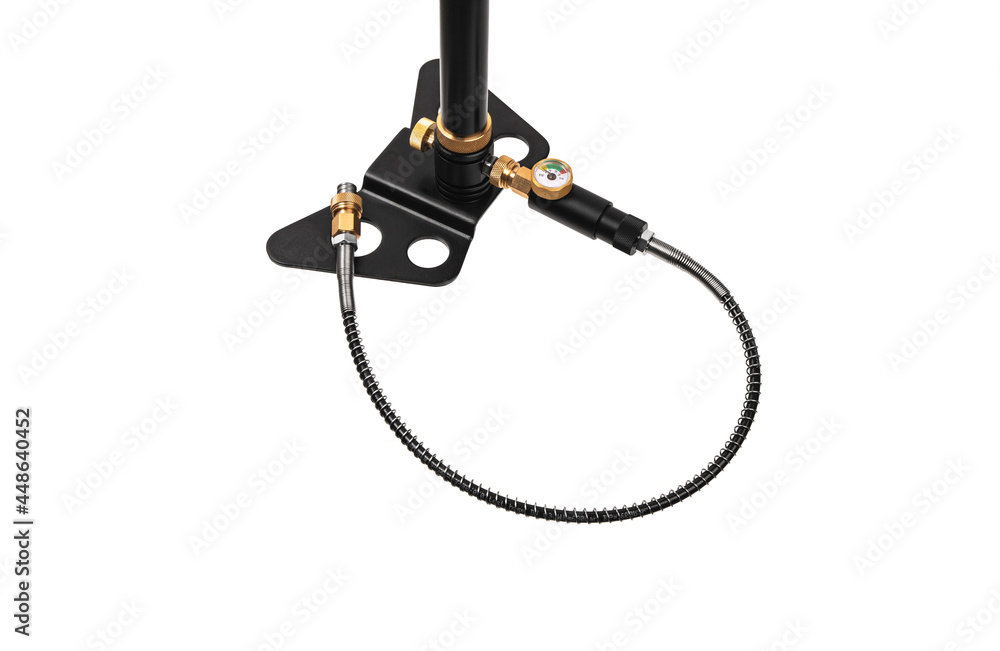 Modern air pump with a barometer. Part of bicycle hand pump with pressure gauge isolate on white back Modern air pump with a barometer. Part of bicycle hand pump with pressure gauge isolate on white back