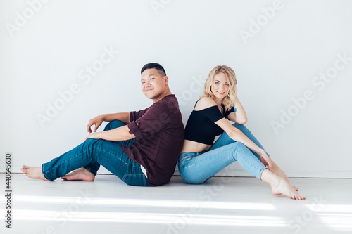 portrait of a beautiful man and woman on a light background