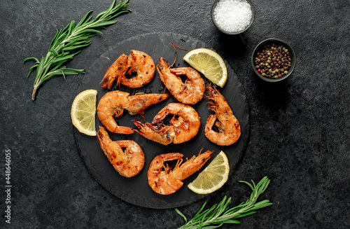 grilled giant prawns on a stone background