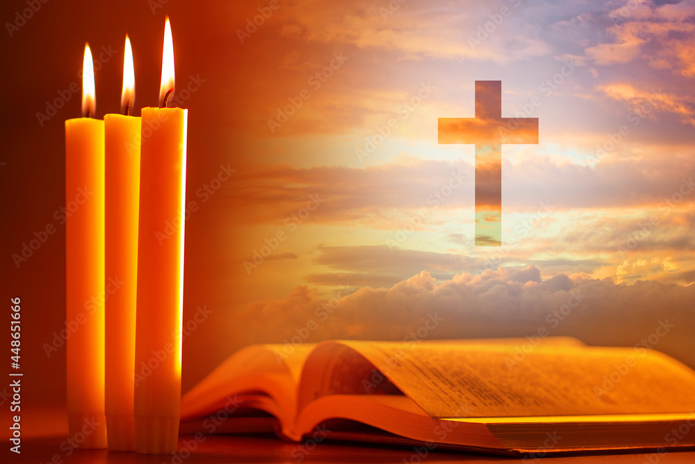 Magic light emanating from open old book. Book symbolizes holy bible