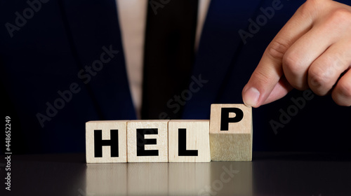 dice forming the word HELP, business concept