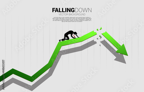 silhouette of businessman on the knee on cracking growing arrow. Concept for depression and obstacle business.