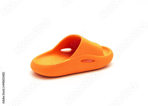 Single orange pillow slide sandal for toddler non-slip foam slippers isolated on white