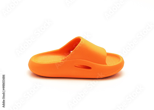 Single orange pillow slide sandal for toddler non-slip foam slippers isolated on white