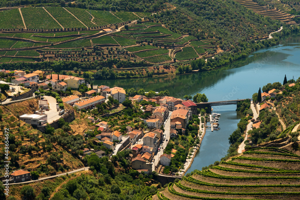 Scenic view of the beautiful Pinhão village surounded by vineyards in the beautiful Douro river valley, Vila Real district, Viseu district, Portugal - obrazy, fototapety, plakaty 